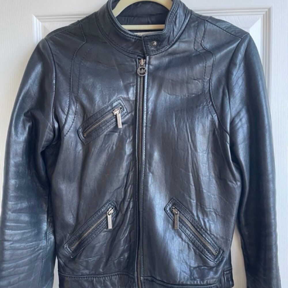 Black leather moto jacket by Michael Kors